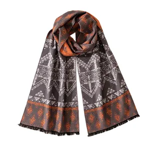 Elegant silk brushed long scarf featuring orange geometric ethnic pattern and soft fringe