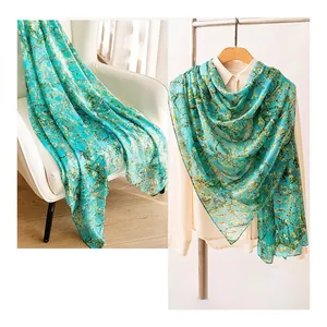 Premium silk scarf with blue almond blossom print for elegant spring styling