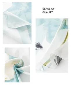 Macro view showing the smooth texture of an elegant silk satin long printed scarf