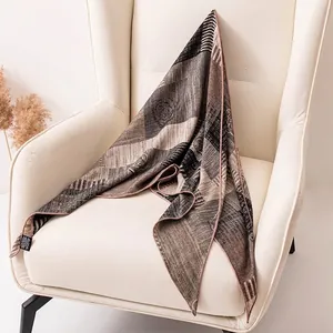 Elegant handmade silk wool blend triangle scarf featuring chic brown striped patterns
