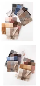 Collection of various colorful plaid scarves with soft fringes for winter warmth.