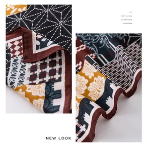 Close-up of soft breathable cotton linen neck scarf with colorful floral patterns
