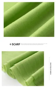 Macro shot of vibrant green soft wool scarf showing fine woven texture and elegant folds