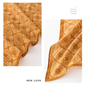 Close-up detail showing the vintage paisley pattern and soft texture of the scarf