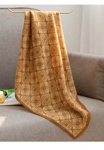 Detailed shot of an elegant vintage printed scarf with complex mandala patterns