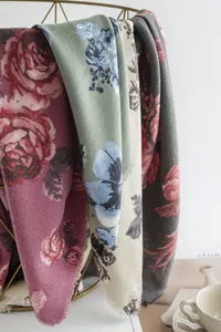 Close-up of elegant rose print imitation cashmere scarves in various autumn colors