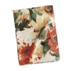 Elegant floral printed cashmere-like shawl scarf for women in warm autumn colors.