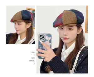 Close-up of a colorful patchwork Harris Tweed beret worn by an Asian model