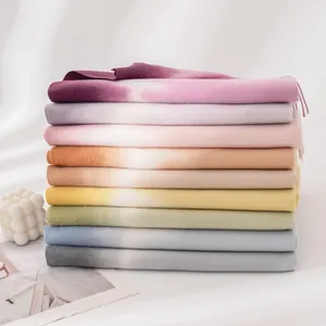 Stacked soft cashmere-feel scarves with elegant gradient tie-dye colors for autumn winter.