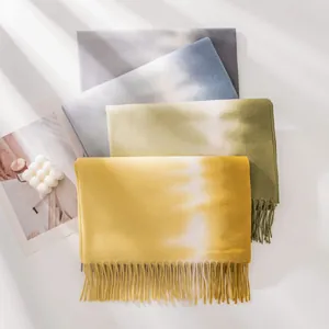 High-quality tie-dye cashmere-feel scarves with elegant tassels displayed in four colors