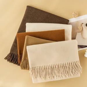 Selection of solid color neutral mimic cashmere scarves with elegant fringe details