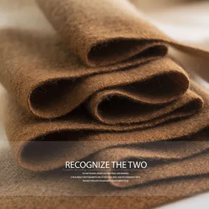 Soft brown cashmere-feel scarf with delicate texture for autumn and winter