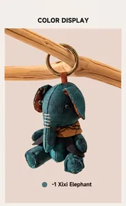 Détail d'un pendentif éléphant en soie fait main suspendu à un anneau en bronze