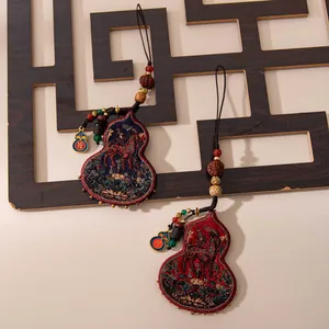 Handmade silk gourd charm with embroidered horse motif, traditional Guochao mascot