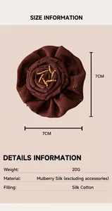 Detail view of handmade mulberry silk flower pendant showing 7cm x 7cm dimensions.