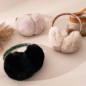 Detail of soft plush rabbit fur earmuffs in multiple colors with ethnic headbands