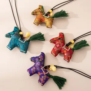 Handmade embroidered horse zodiac pendants with tassels in various vibrant colors