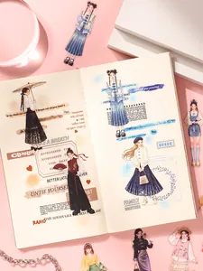 Vue détaillée de divers autocollants de tenues à la mode dans un journal intime