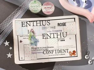 Detailed shot of decorative PET tape with star and dot patterns on a scrapbook page