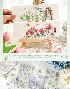 Detail view of floral PET stickers and illustrated bookmarks for journaling