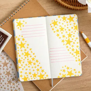 Kreative Sternmuster-Schablonen für Journaling und DIY-Malerei auf Karopapier-Notizbuch