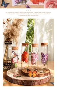 Decorative butterfly and floral PET stickers for journals in glass vial display