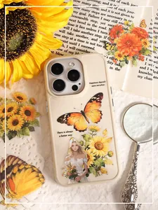 Close-up detail of vintage floral and butterfly PET stickers used for decorating a phone case