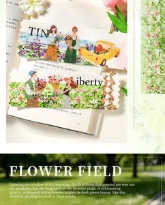 Detail view of floral washi tape with character and nature illustrations for scrapbooks