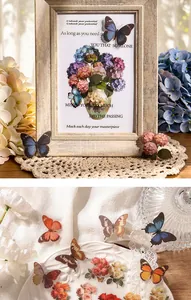 Detailed view of waterproof PET stickers featuring vintage floral and butterfly motifs