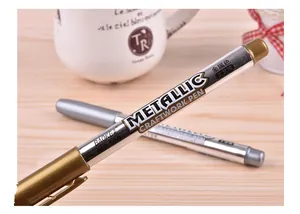 Close-up detail of a Baoke gold metallic craftwork paint pen for DIY greeting cards