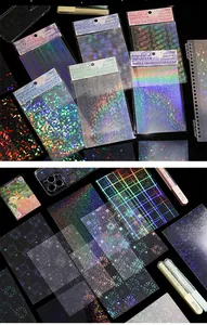 Detail view of colorful holographic laser flash film stickers for scrapbooking DIY.