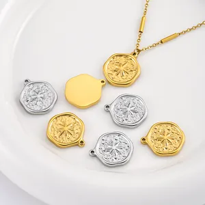 Detail view of gold and silver hammered star pendants for DIY jewelry making.