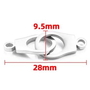 Macro detail of polished stainless steel handcuff pendant connector for jewelry