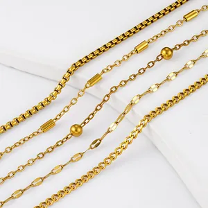 Macro detail showing different styles of 18k gold plated titanium steel necklaces