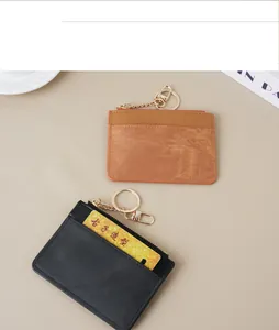 Detail view of multi-functional women's cardholders with zippers and keychains