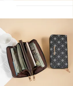 Detail view of women's soft leather long wallet with double zipper and phone pocket