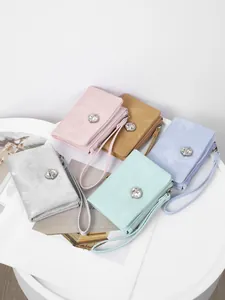 Elegant women's short wallets with rhinestone clasp and wrist strap in five colors