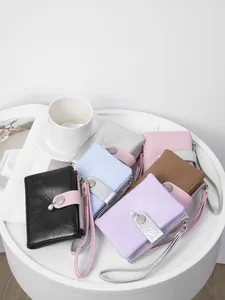 Exquisite elegant women's short wallet with burst pattern texture and pearl charm wristlet.