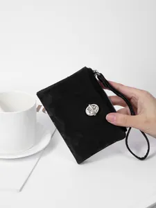 Elegant black velvet short wallet for women featuring rhinestones and a wristlet strap