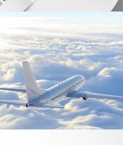 Airplane flying above clouds representing travel and flight atmosphere for travel accessories