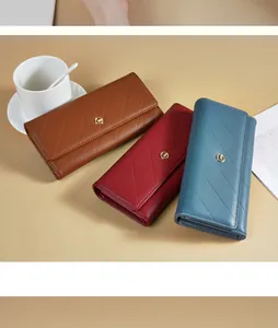 Elegant quilted leather long wallets for women in brown red and blue color variants