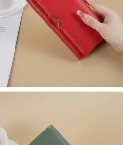 Close-up of an elegant red PU leather long wallet featuring a gold V-shaped metal hardware