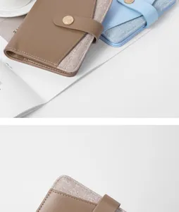 Detail of travel passport wallet with dual-material texture and golden snap button