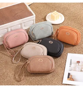 Detailed view of women's double zipper clutch wallets in a range of stylish colors