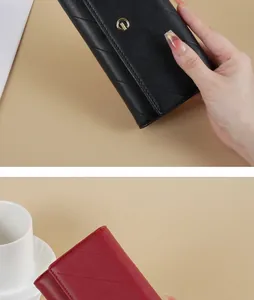 Close-up of elegant quilted long wallets in black and red colors
