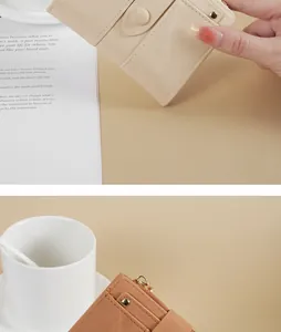 Detailansicht der zweifach gefalteten PU-Ledergeldbörsen in Beige und Braun mit Reißverschluss.