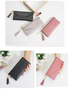 Carteras largas y delgadas para mujer con dijes de corazón y detalles de borla