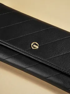 Elegant black quilted leather long wallet for women with gold circular metal logo