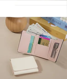 Compact Japanese style trifold wallet with cute bunny embossing and multiple card slots