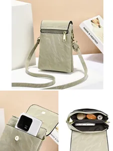 Vintage saliegroene crossbody telefoontas met handige meerdere vakken en ritsen